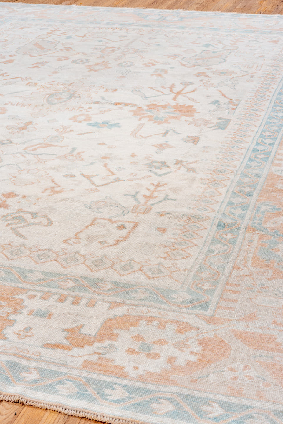 10' x 13' one-of-a-kind handmade vintage Oushak large size rug. Color palette: ivory, peach, aqua, sand, light blue, taupe