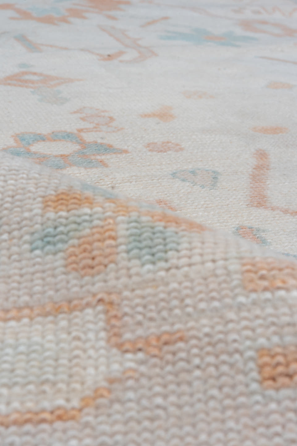 10' x 13' one-of-a-kind handmade vintage Oushak large size rug. Color palette: ivory, peach, aqua, sand, light blue, taupe