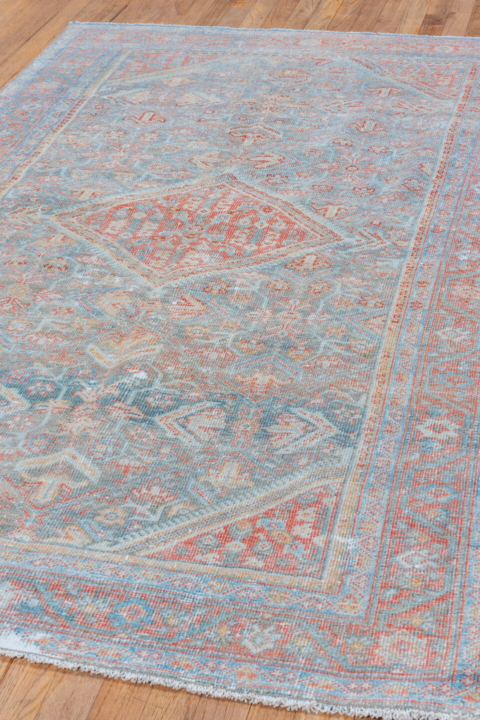 4' x 6' one-of-a-kind handmade vintage Mahal small size rug. Color palette: sky blue, coral, ivory, terra cotta, slate