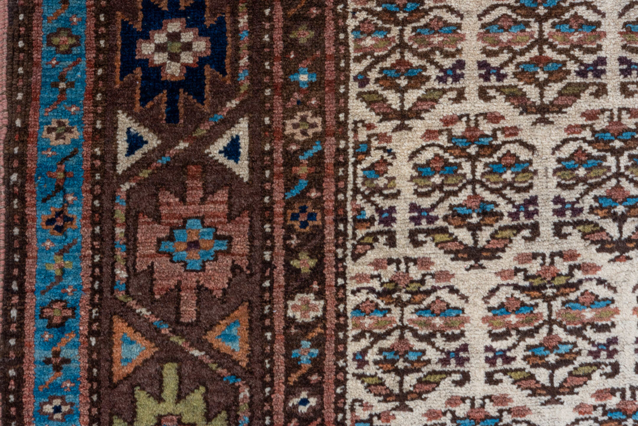 3' x 16' one-of-a-kind handmade vintage Kurd runner rug. Color palette: ivory, rust, brown, sky_blue, indigo, camel, navy