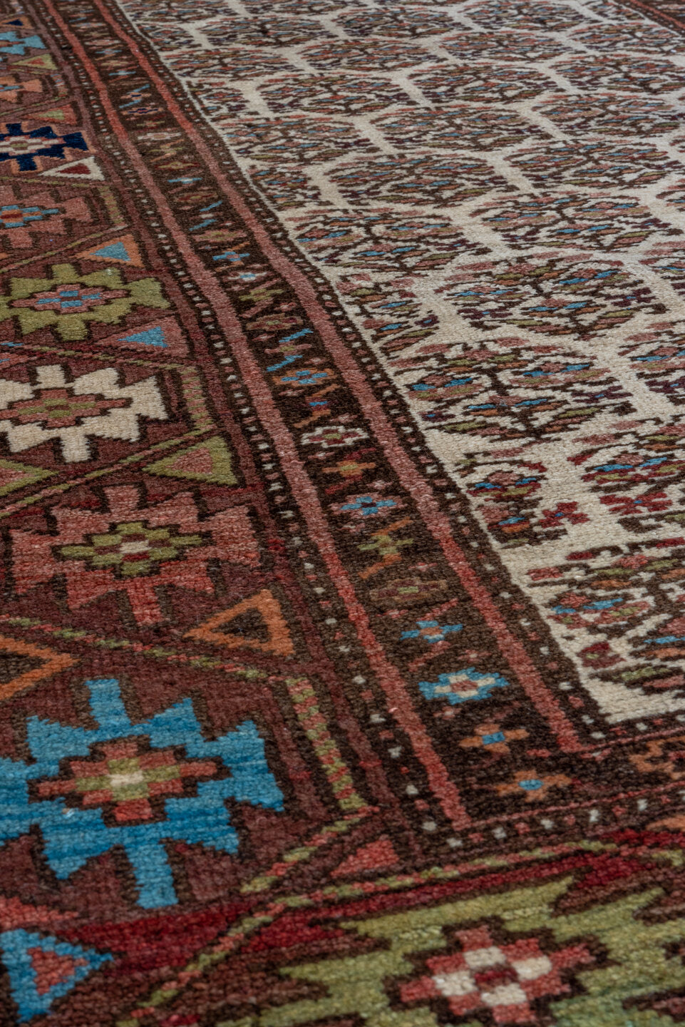 3' x 16' one-of-a-kind handmade vintage Kurd runner rug. Color palette: ivory, rust, brown, sky_blue, indigo, camel, navy