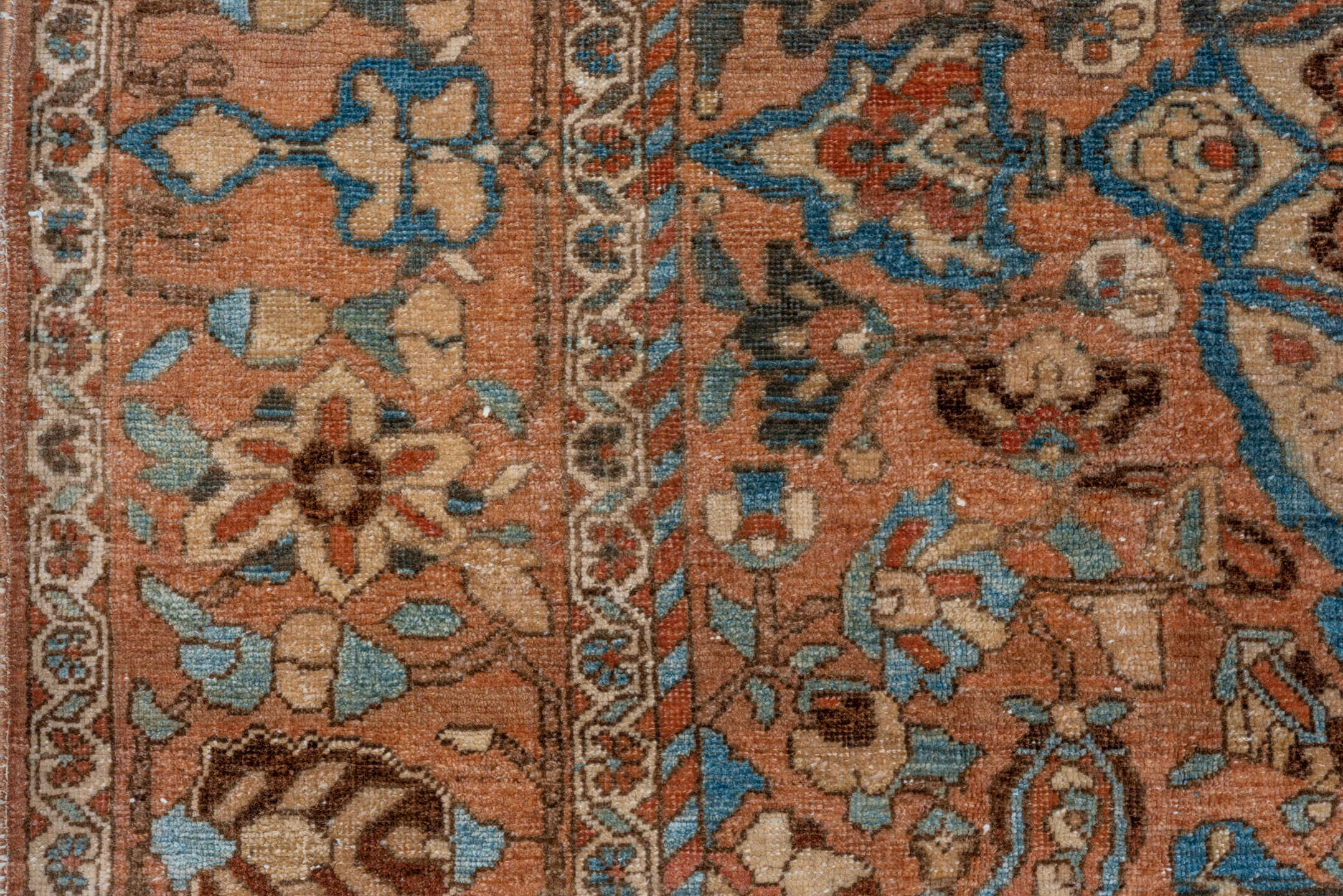 7' x 9' one-of-a-kind handmade vintage Baktiary rug. Color palette: terra cotta, sky blue, ivory, brown, camel, slate