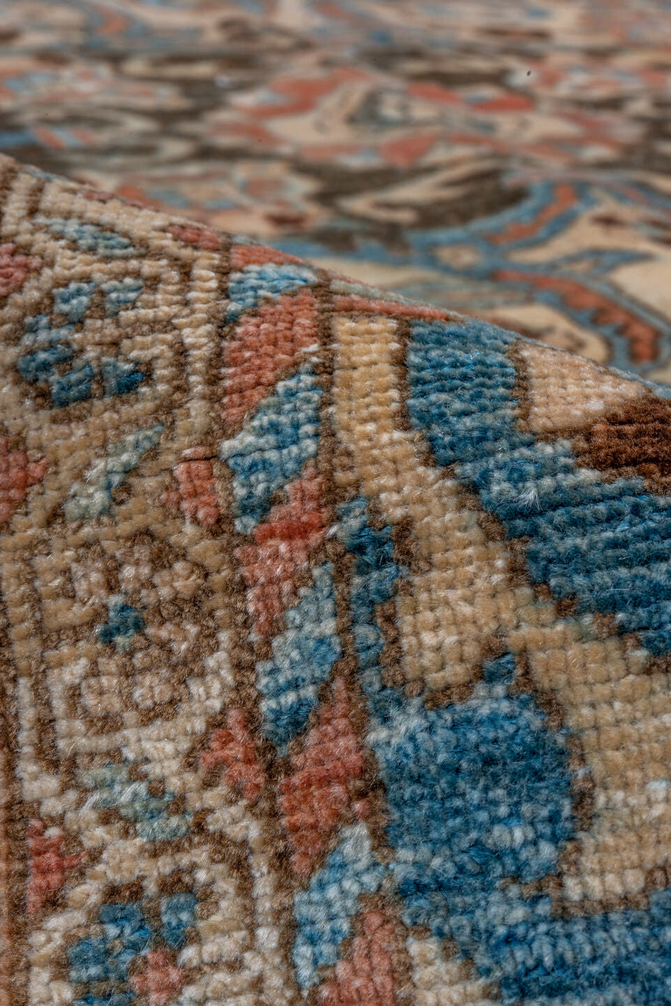 7' x 9' one-of-a-kind handmade vintage Baktiary rug. Color palette: terra cotta, sky blue, ivory, brown, camel, slate