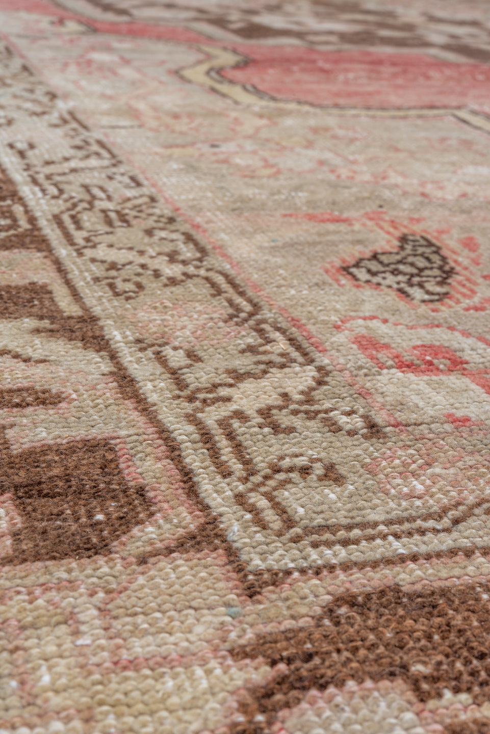 7' x 12' one-of-a-kind handmade vintage Oushak large size rug. Color palette: brown, gray, light gray, off-white, pink