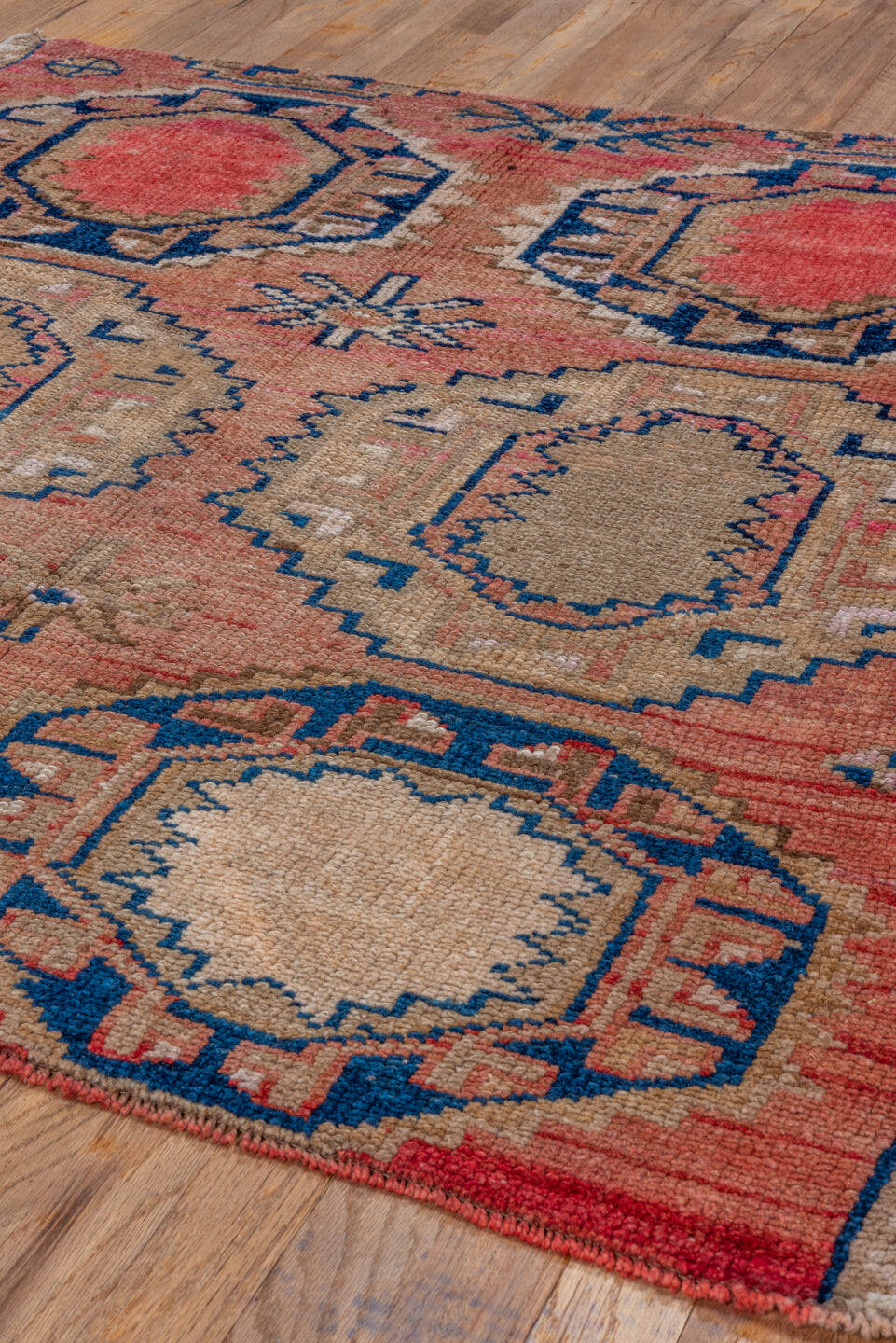 4' x 4' one-of-a-kind handmade antique Kars small size rug. Color palette: coral, camel, navy, ivory, rose, taupe, crimson