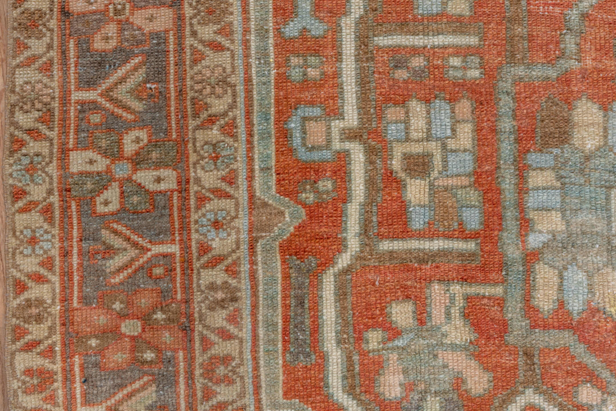 4' x 7' one-of-a-kind handmade vintage Serapi rug. Color palette: terra cotta, rust, slate, ivory, taupe, charcoal, camel