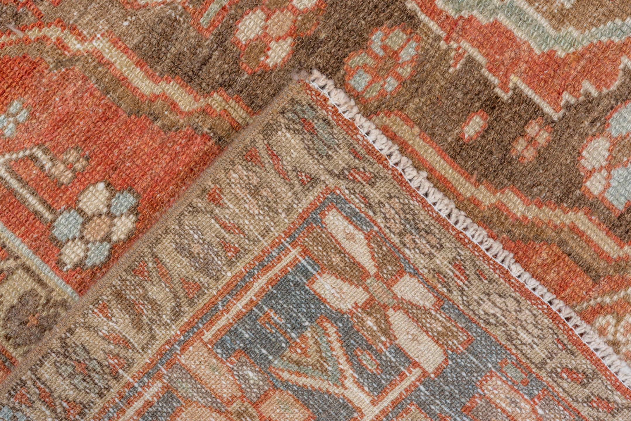 4' x 7' one-of-a-kind handmade vintage Serapi rug. Color palette: brown, gray, light gray, off-white, pink