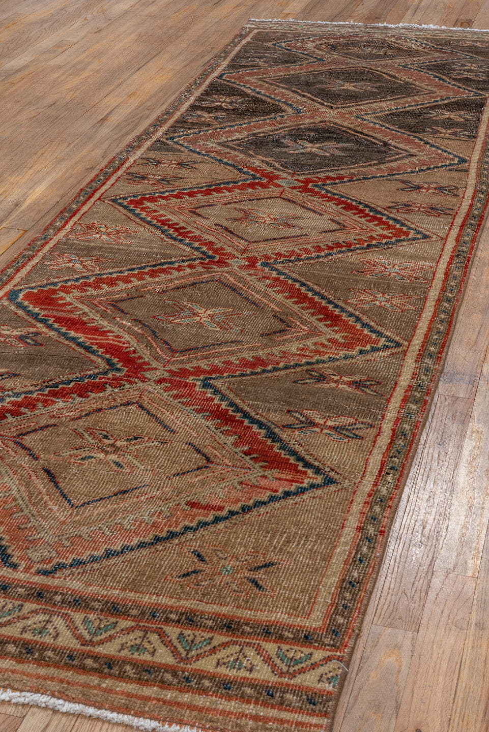 2' x 9' one-of-a-kind handmade vintage Bidjar runner rug. Color palette: brown, camel, taupe, rust, ivory, navy, beige, gray