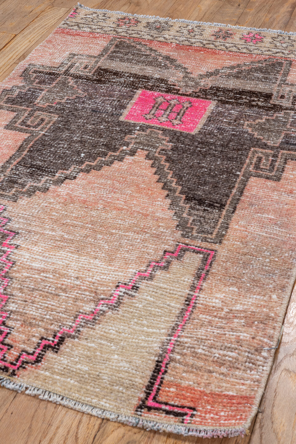 2' x 3' one-of-a-kind handmade vintage Oushak small size rug. Color palette: peach, charcoal, ivory, hot pink, taupe, coral