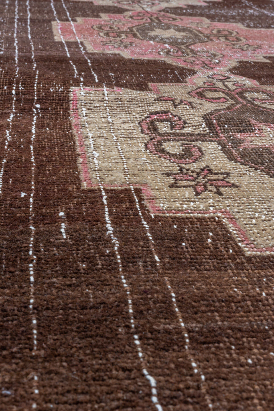 2' x 7' one-of-a-kind handmade vintage Kars runner rug. Color palette: brown, ivory, rose, taupe, dusty pink, pink, red