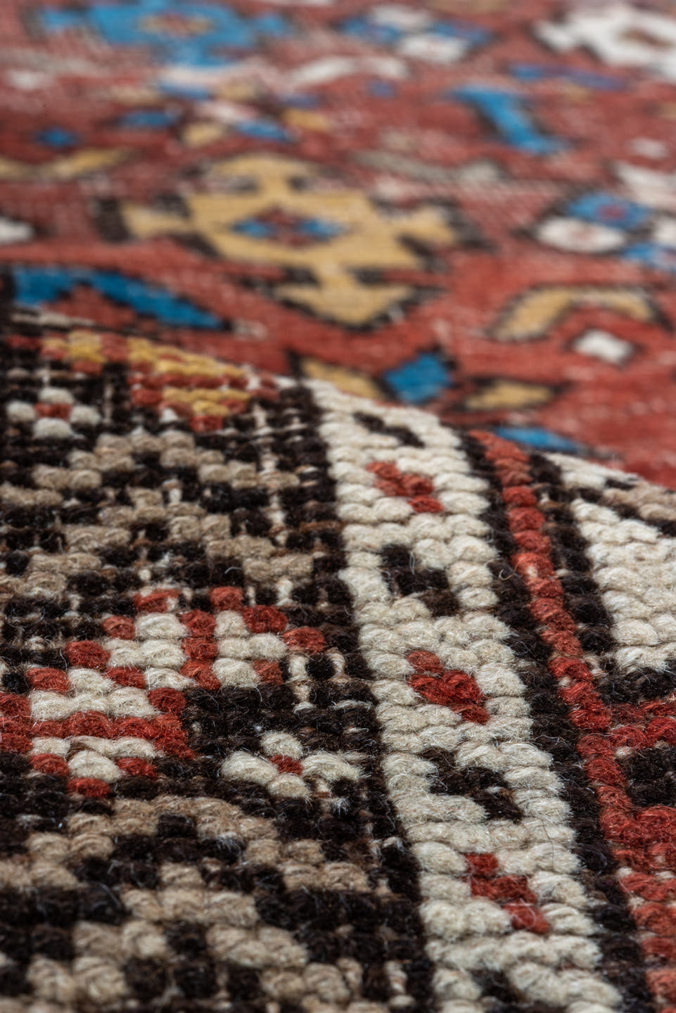4' x 7' one-of-a-kind handmade vintage Shirvan rug. Color palette: rust, ivory, blue, camel, brown, charcoal, terracotta