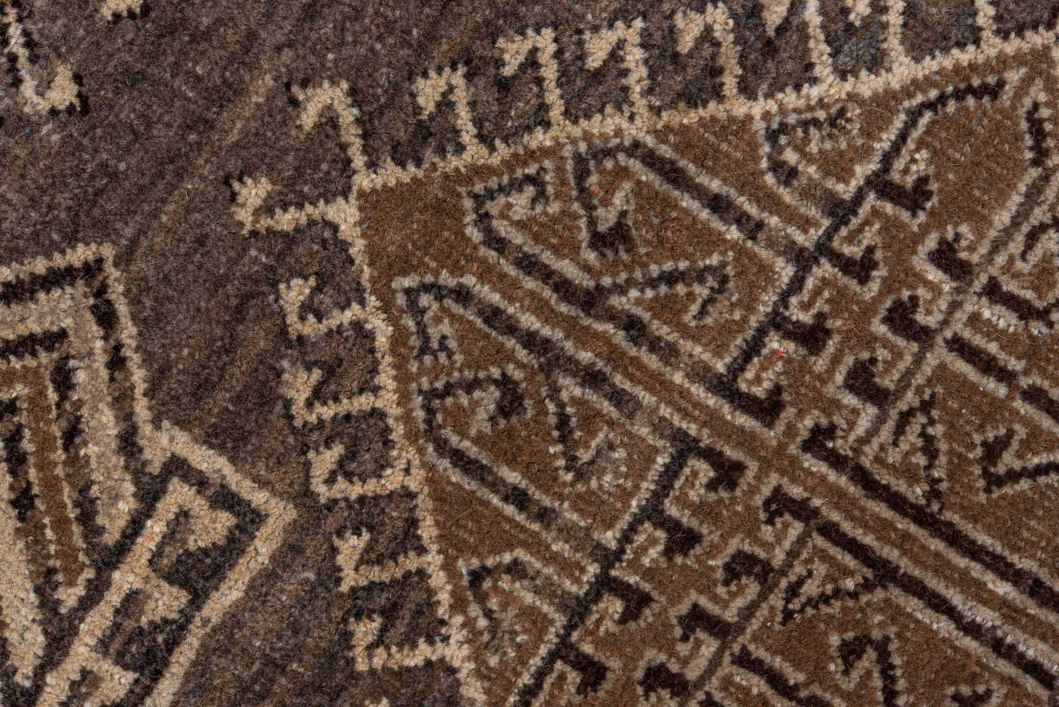 7' x 9' one-of-a-kind handmade vintage Afghan rug. Color palette: taupe, brown, ivory, charcoal, camel, beige, gray, black