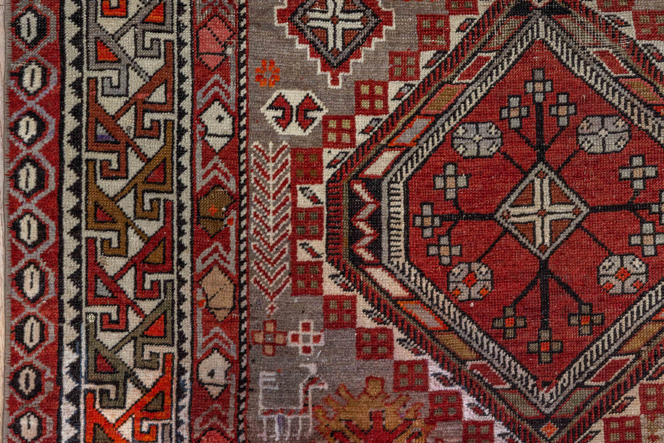 4' x 7' one-of-a-kind handmade vintage Shirvan rug. Color palette: ivory, crimson, charcoal, camel, taupe, mahogany, red