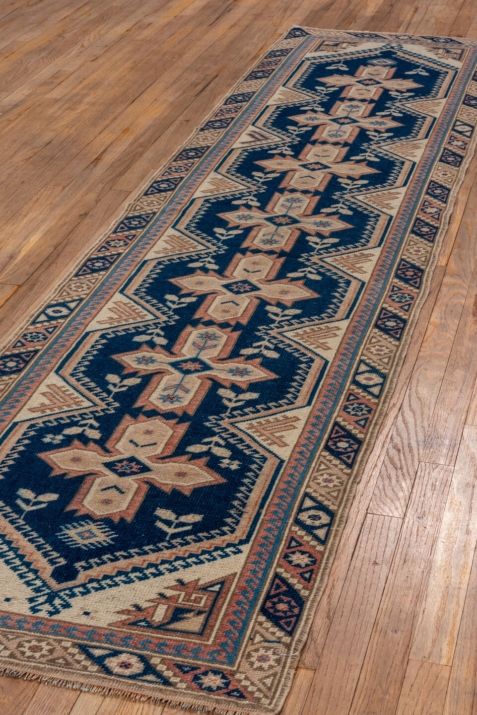 2' x 9' one-of-a-kind handmade vintage Oushak runner rug. Color palette: navy, ivory, blush, taupe, camel, blue, pink, beige