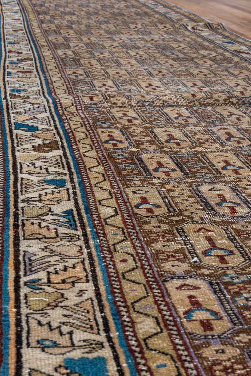 3' x 18' one-of-a-kind handmade vintage Shirvan runner rug. Color palette: ivory, camel, taupe, slate, rust, blue, brown