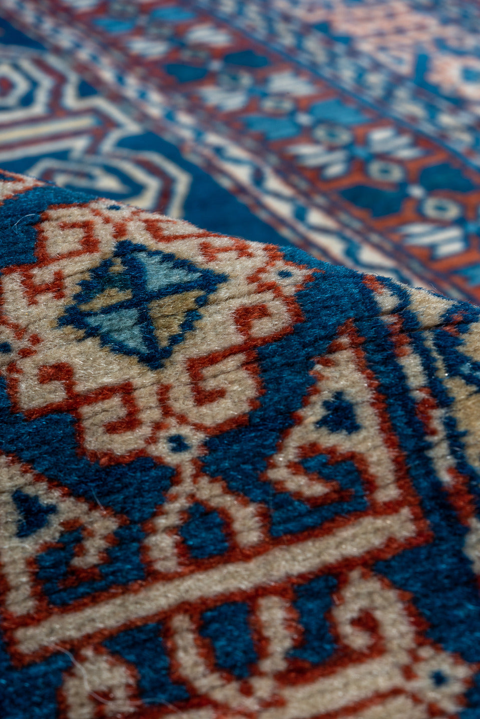 4' x 5' one-of-a-kind handmade vintage Shirvan small size rug. Color palette: navy, ivory, rust, sky_blue, crimson, camel