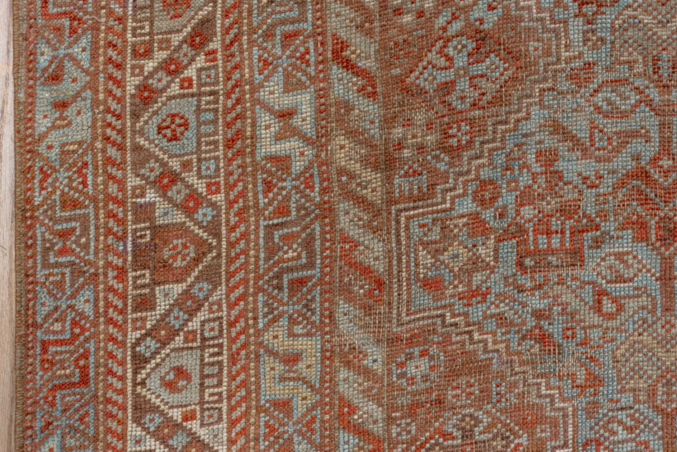 7' x 10' one-of-a-kind handmade vintage Shiraz large size rug. Color palette: rust, ivory, terra cotta, sky blue, camel