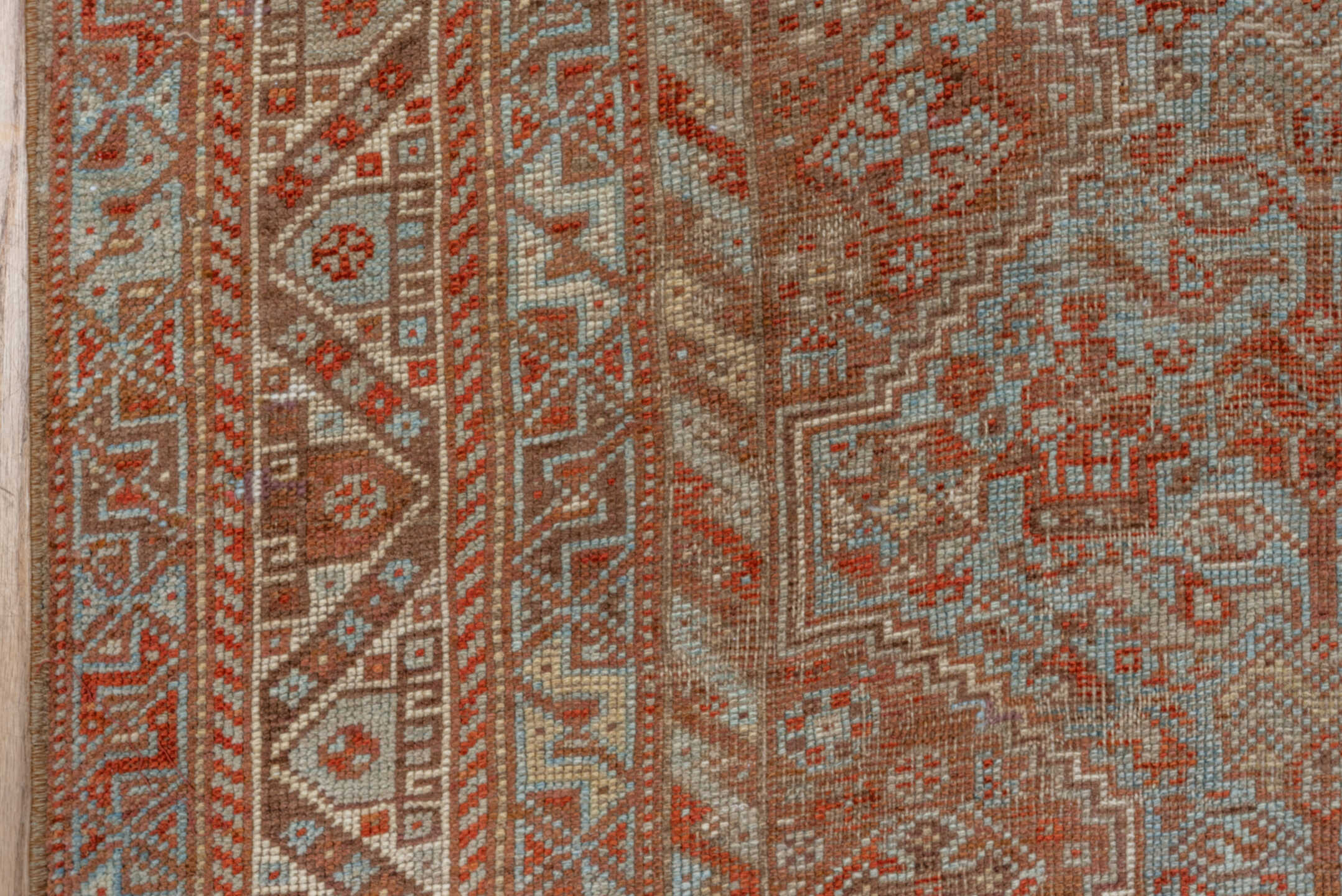 7' x 10' one-of-a-kind handmade vintage Shiraz large size rug. Color palette: rust, ivory, terra cotta, sky blue, camel