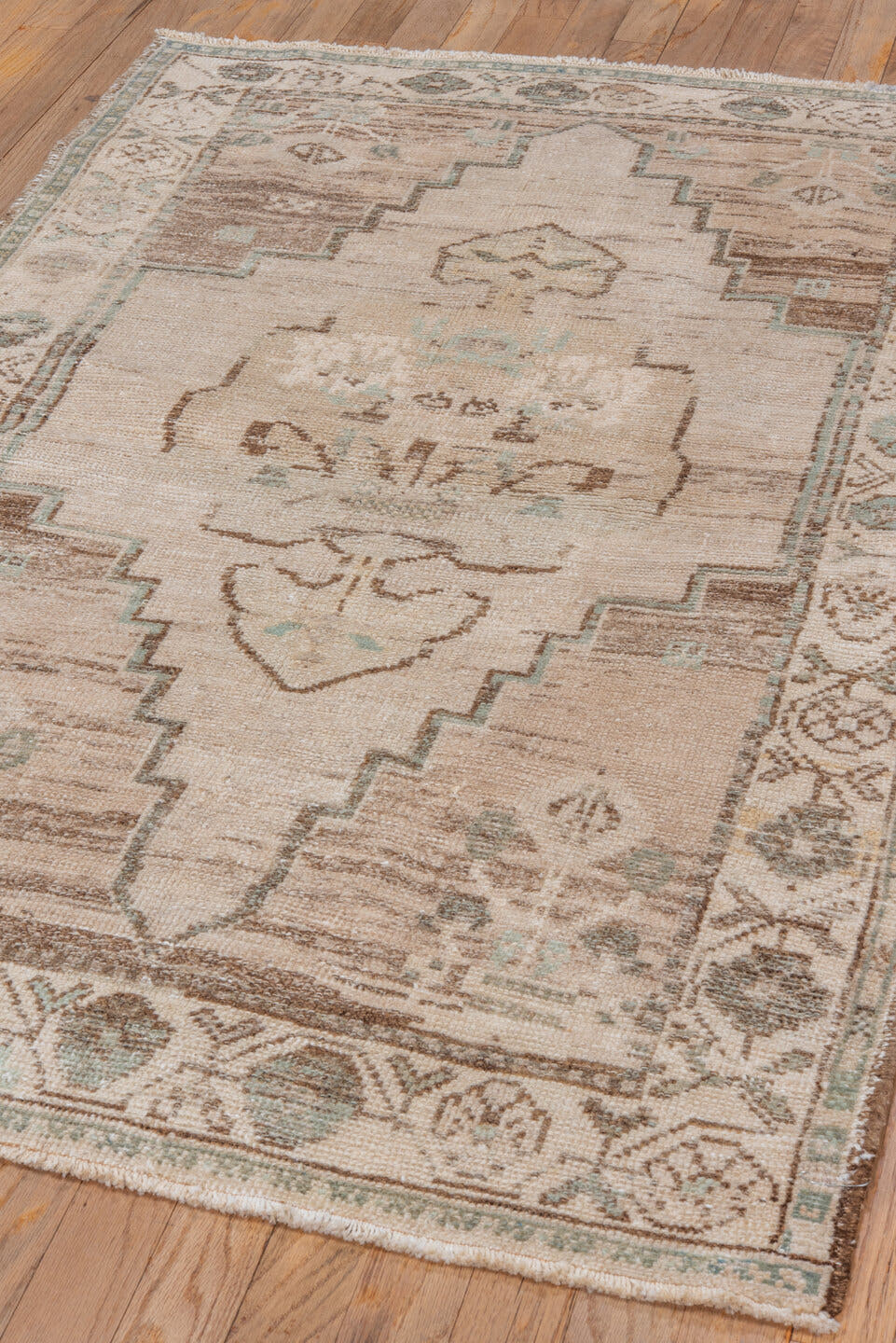 3' x 4' one-of-a-kind handmade vintage Oushak small size rug. Color palette: ivory, taupe, brown, pale aqua, beige, gray