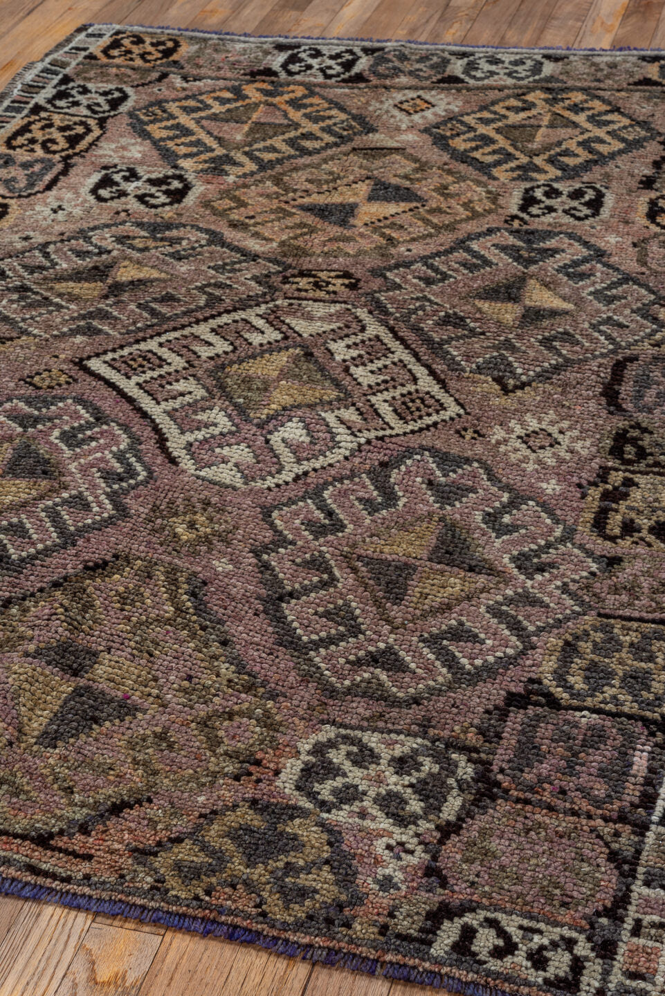 4' x 5' one-of-a-kind handmade vintage Kars small size rug. Color palette: black, brown, charcoal, gray, light gray, pink