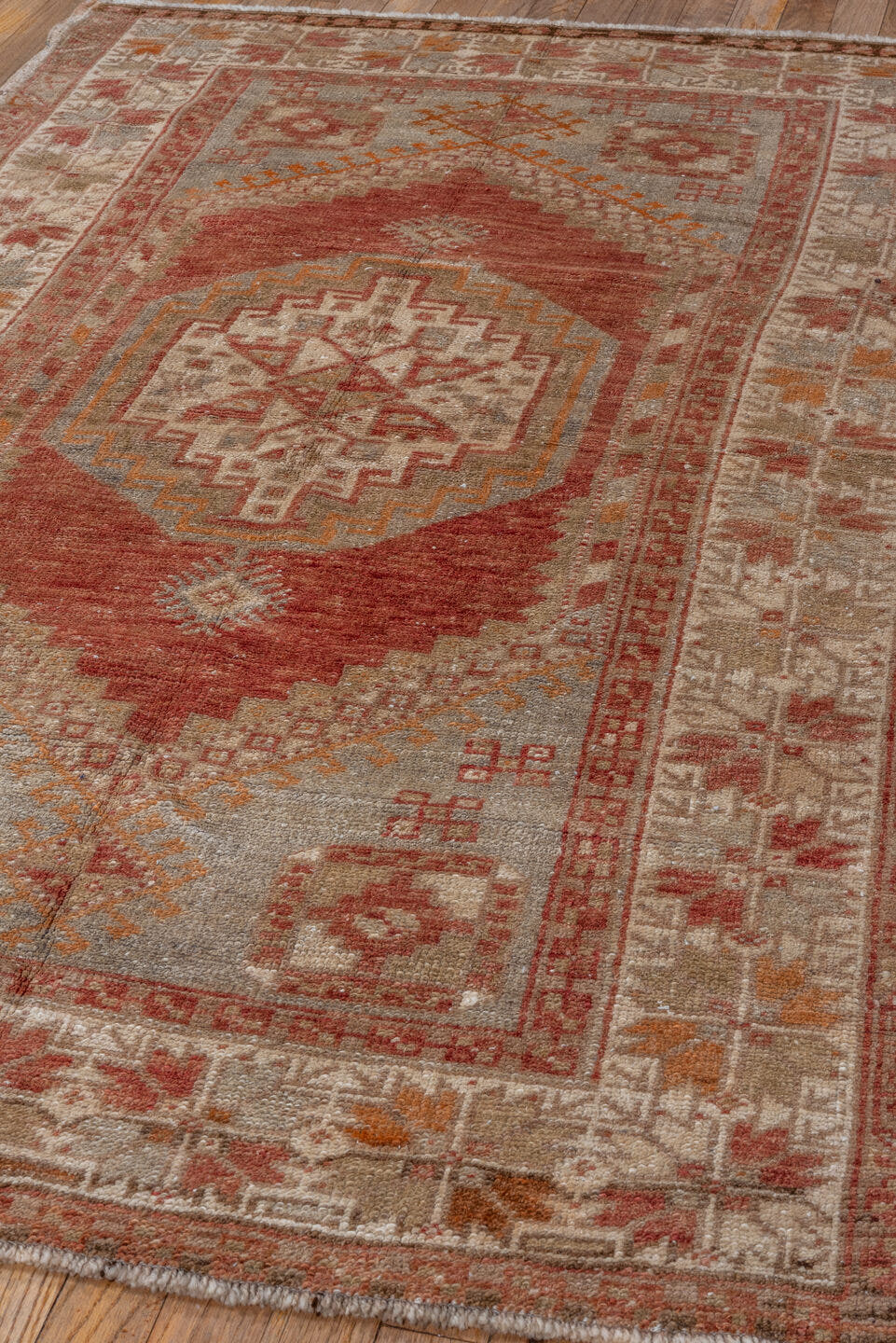 3' x 5' one-of-a-kind handmade vintage Kars small size rug. Color palette: ivory, coral, taupe, rust, saffron, rose