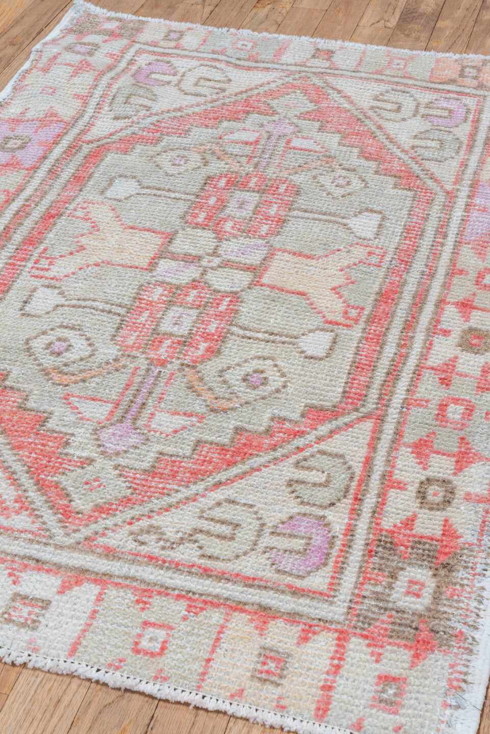 2' x 3' one-of-a-kind handmade vintage Oushak small size rug. Color palette: ivory, coral, taupe, beige, pale lavender