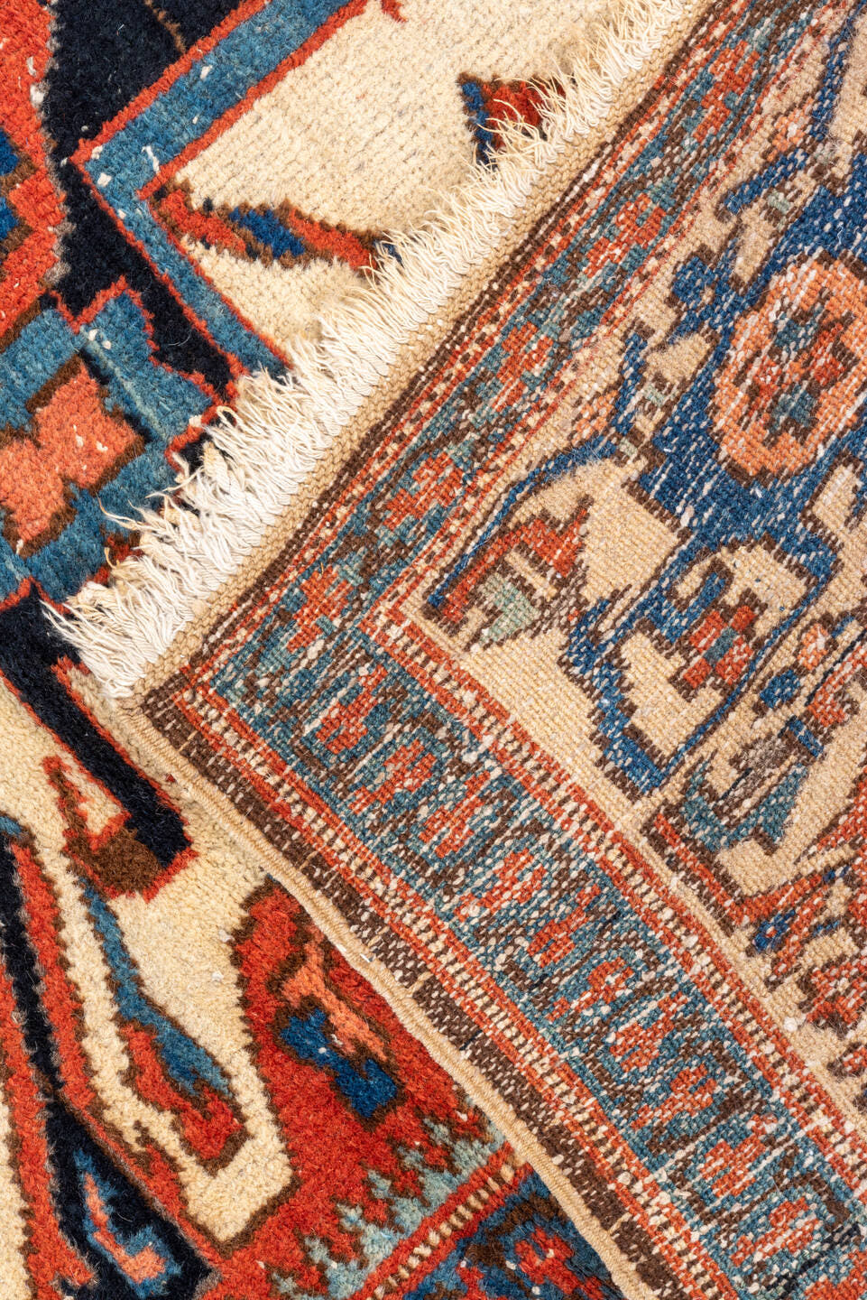 4' x 7' one-of-a-kind handmade vintage Heriz rug. Color palette: rust, ivory, navy, sky_blue, terracotta, charcoal, brown