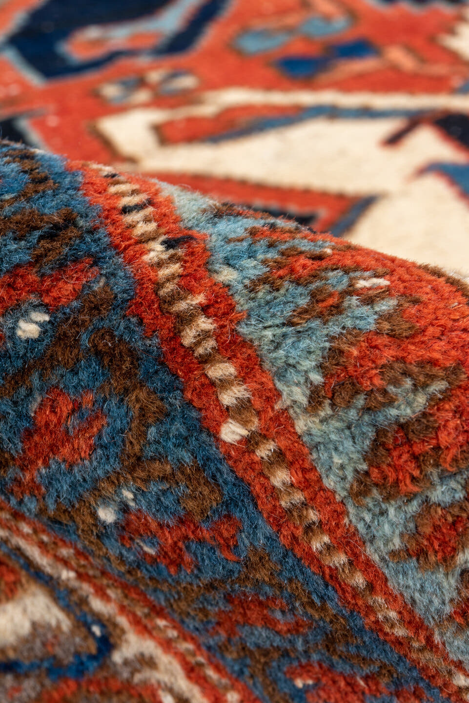 4' x 7' one-of-a-kind handmade vintage Heriz rug. Color palette: rust, ivory, navy, sky_blue, terracotta, charcoal, brown