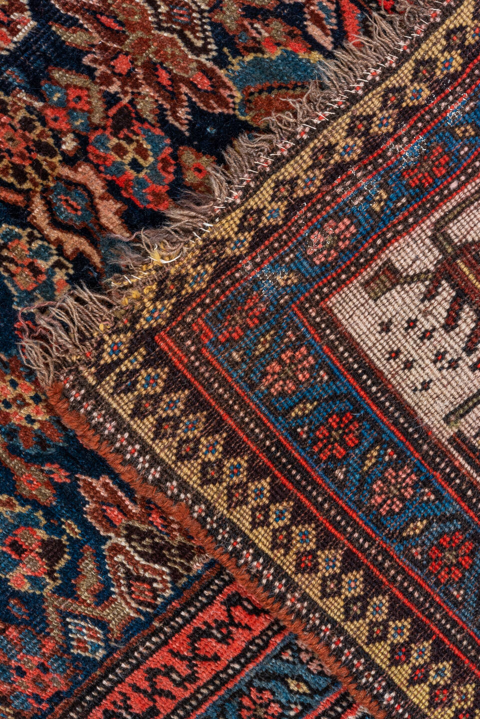 6' x 9' one-of-a-kind handmade vintage Bidjar medium size rug. Color palette: navy, rust, ivory, red, coral, blue, gold