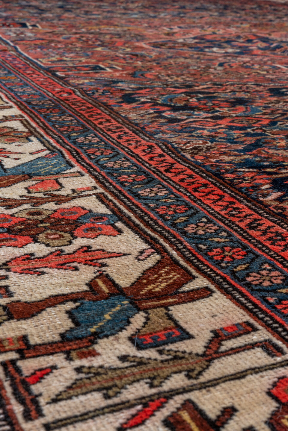 6' x 9' one-of-a-kind handmade vintage Bidjar medium size rug. Color palette: navy, rust, ivory, red, coral, blue, gold
