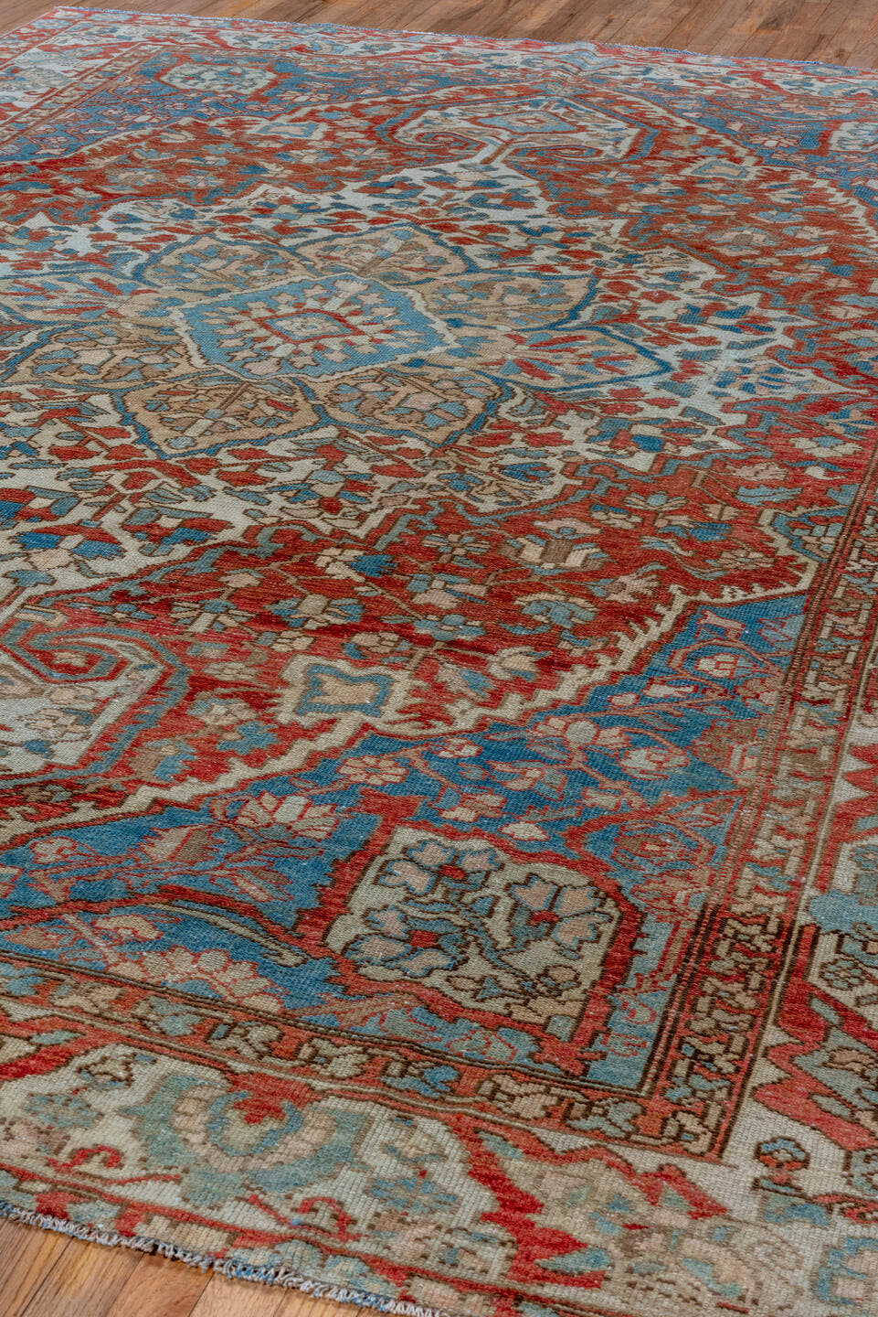 8' x 11' one-of-a-kind handmade vintage Baktiary large size rug. Color palette: rust, ivory, sky blue, taupe, brick, camel