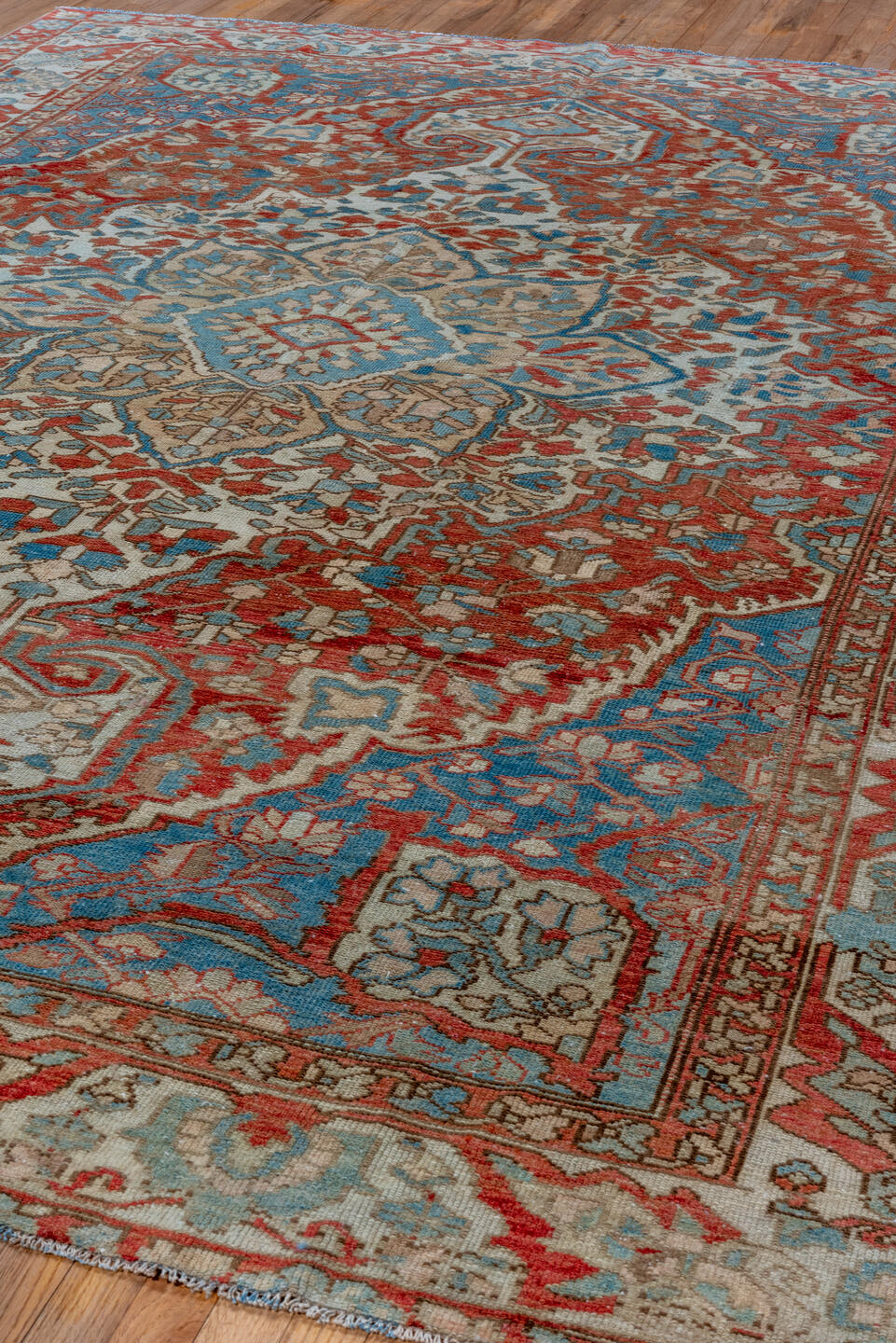 8' x 11' one-of-a-kind handmade vintage Baktiary large size rug. Color palette: rust, ivory, sky blue, taupe, brick, camel