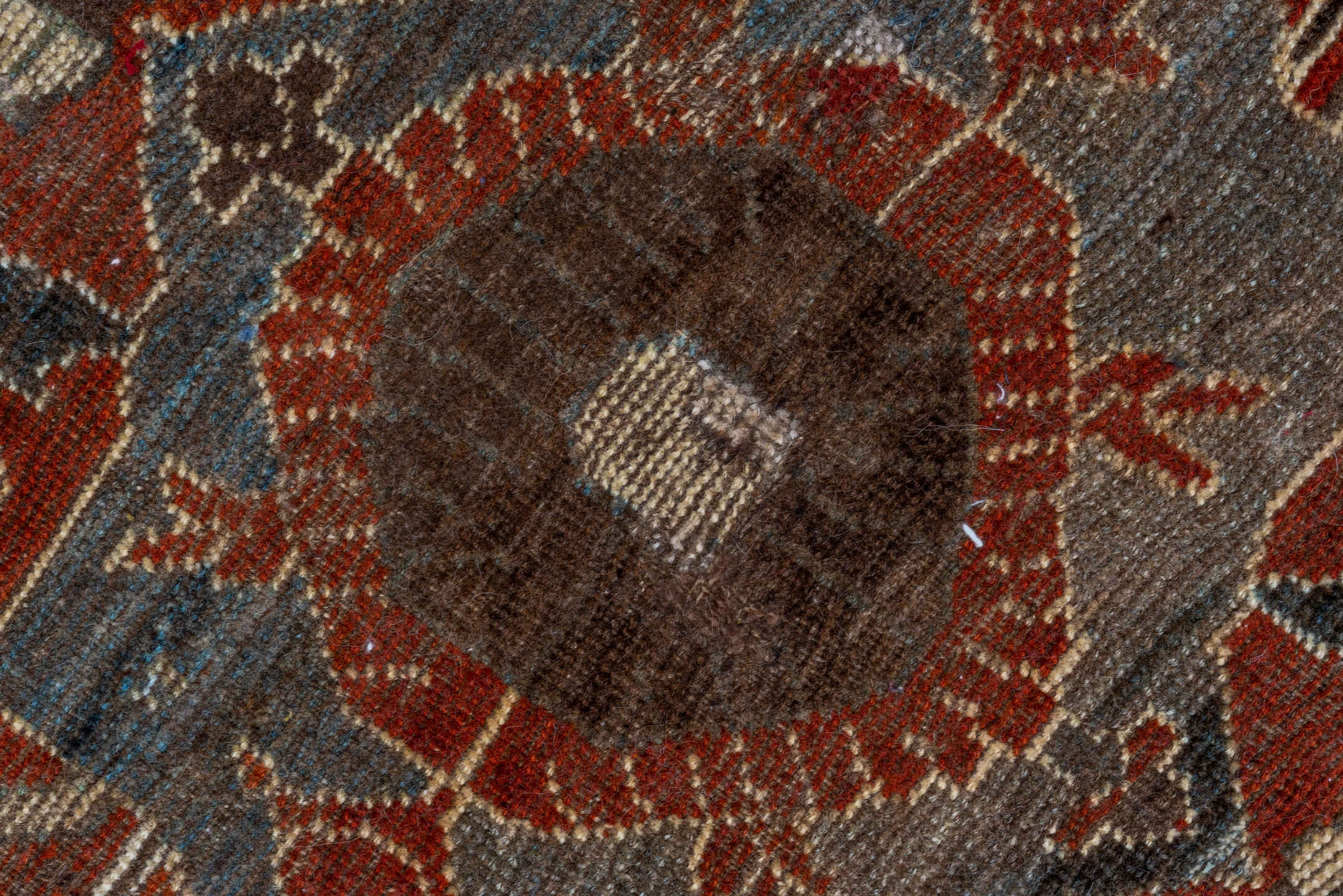 7' x 9' one-of-a-kind handmade vintage Shiraz rug. Color palette: rust, ivory, charcoal, slate, terracotta, brown, sky_blue