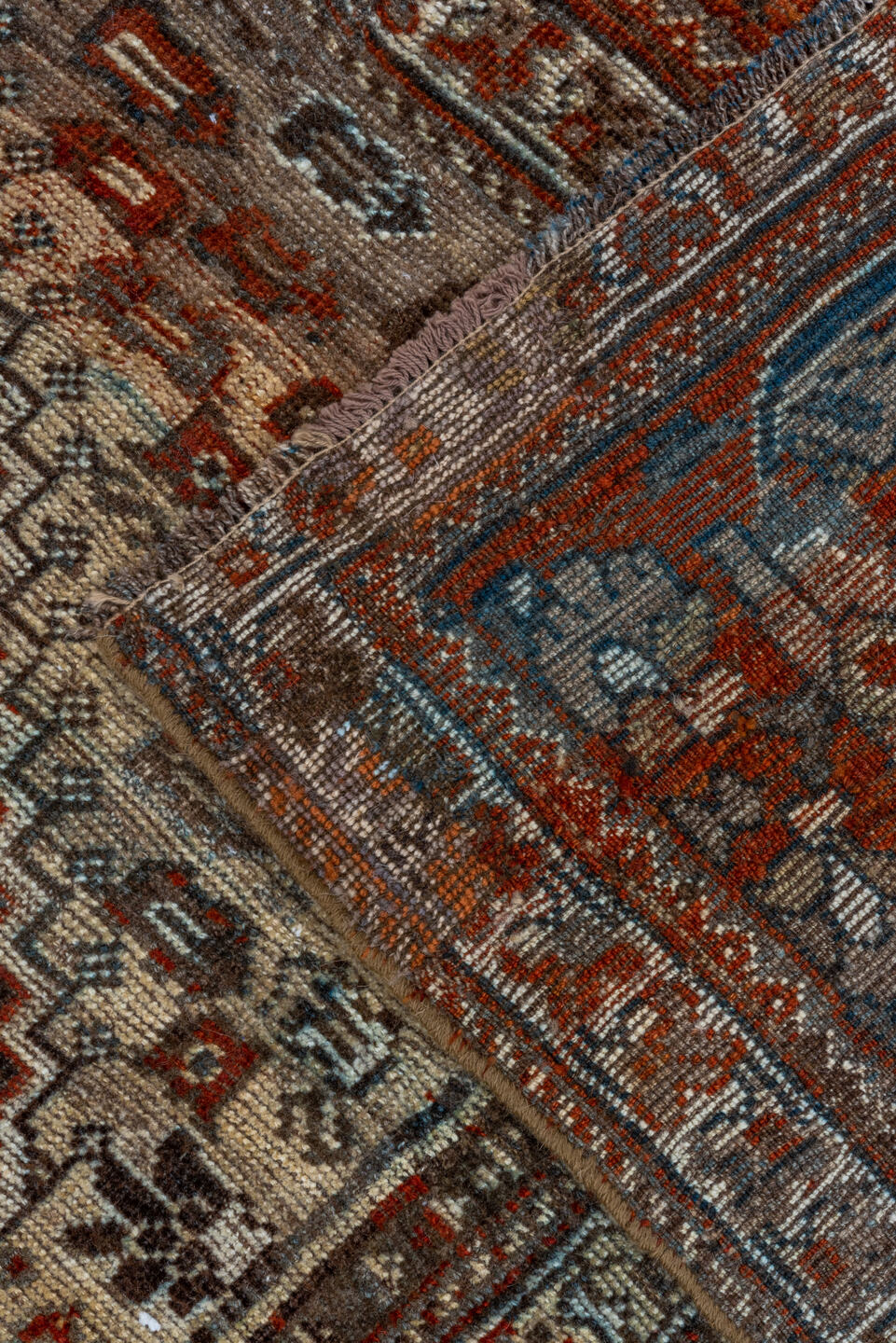 7' x 9' one-of-a-kind handmade vintage Shiraz rug. Color palette: rust, ivory, charcoal, slate, terracotta, brown, sky_blue
