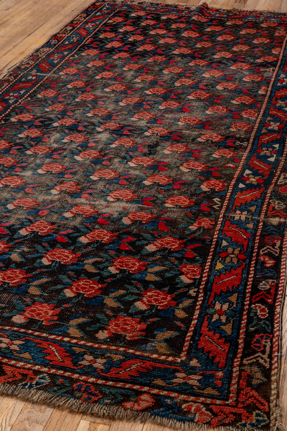 4' x 8' one-of-a-kind handmade antique Karabagh runner rug. Color palette: charcoal, rust, indigo, crimson, ivory, slate