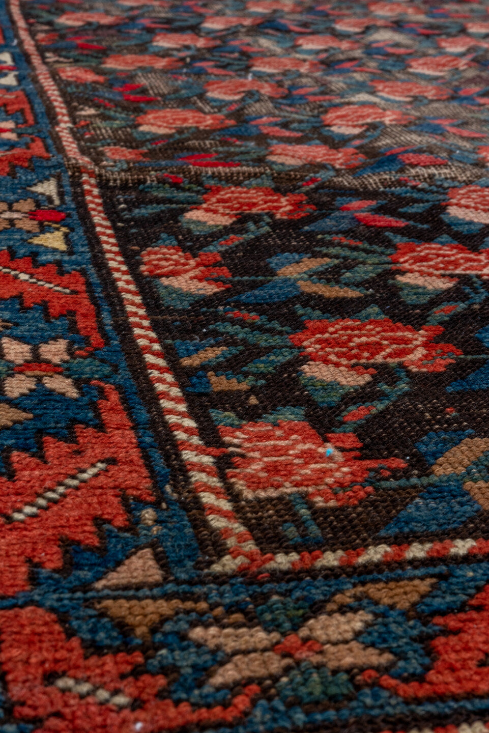 4' x 8' one-of-a-kind handmade vintage Karabagh runner rug. Color palette: arapawa, black, blue, brown, charcoal, fire brick