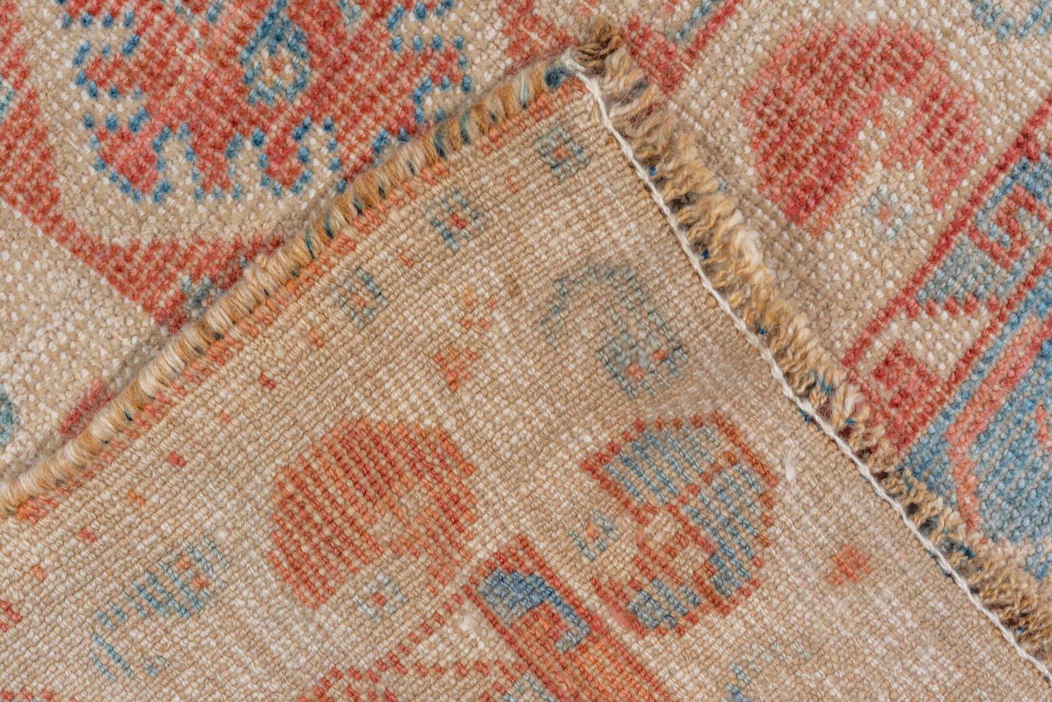 7' x 9' one-of-a-kind handmade vintage Shiraz rug. Color palette: terra cotta, ivory, sky blue, rust, beige, slate