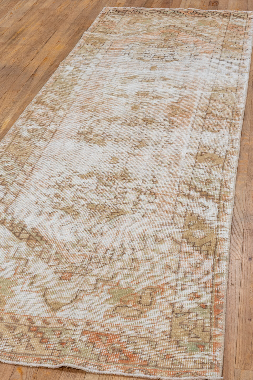3' x 9' one-of-a-kind handmade vintage Oushak runner rug. Color palette: ivory, blush, taupe, beige, camel, sage