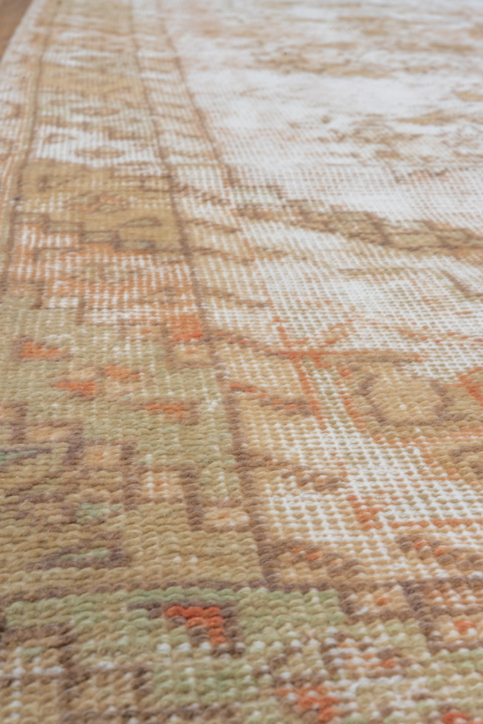 3' x 9' one-of-a-kind handmade vintage Oushak runner rug. Color palette: ivory, blush, taupe, beige, camel, sage