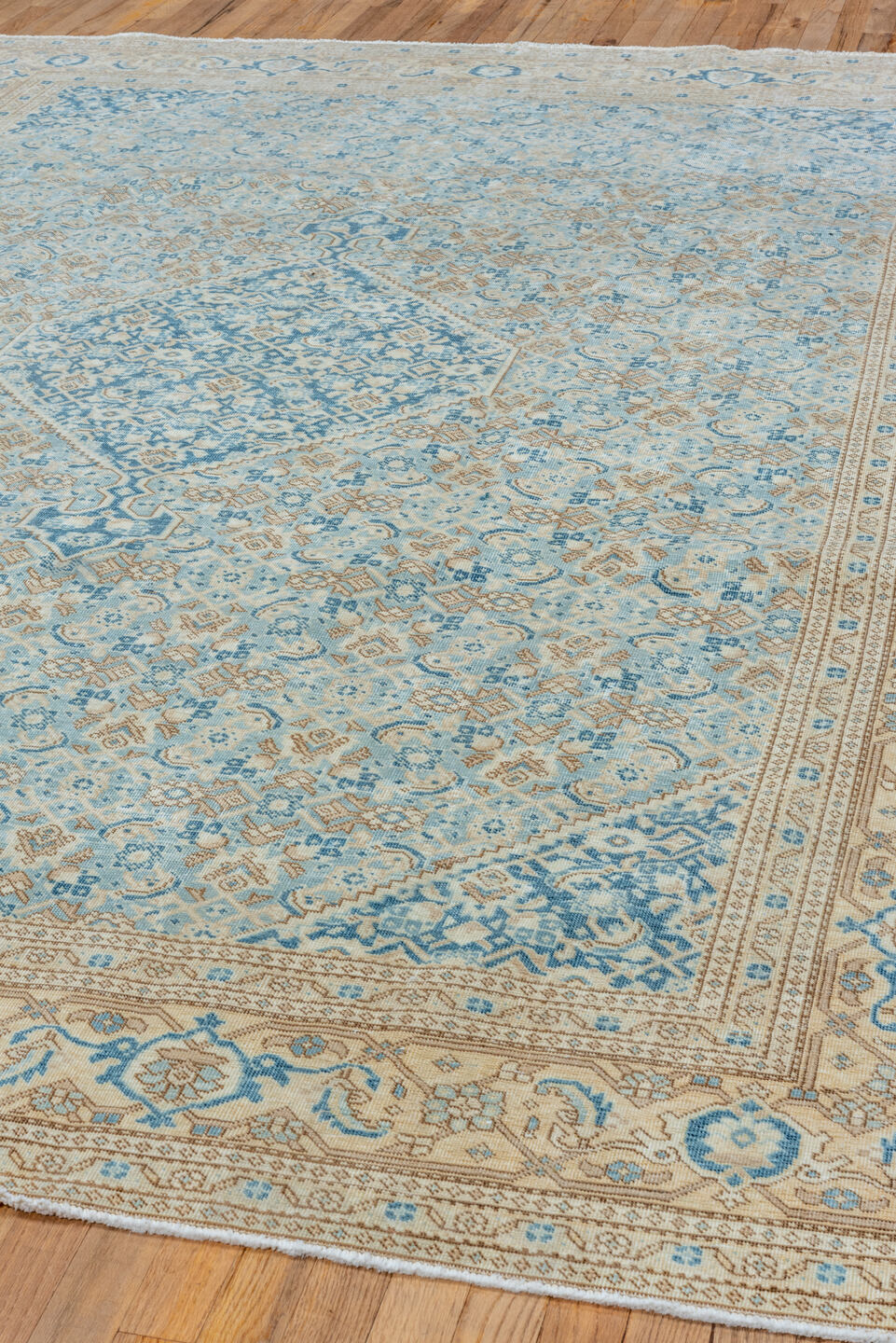 7' x 10' one-of-a-kind handmade vintage Tabriz large size rug. Color palette: ivory, sky blue, beige, tan, slate, camel