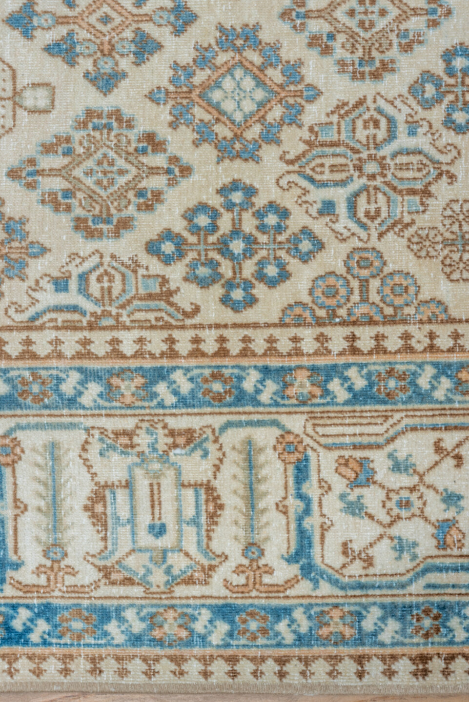 7' x 11' one-of-a-kind handmade vintage Joshegan large size rug. Color palette: ivory, sky blue, taupe, beige, camel