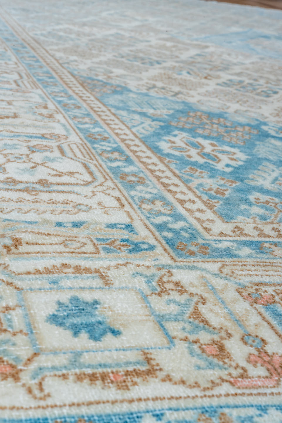 7' x 11' one-of-a-kind handmade vintage Joshegan large size rug. Color palette: ivory, sky blue, taupe, beige, camel