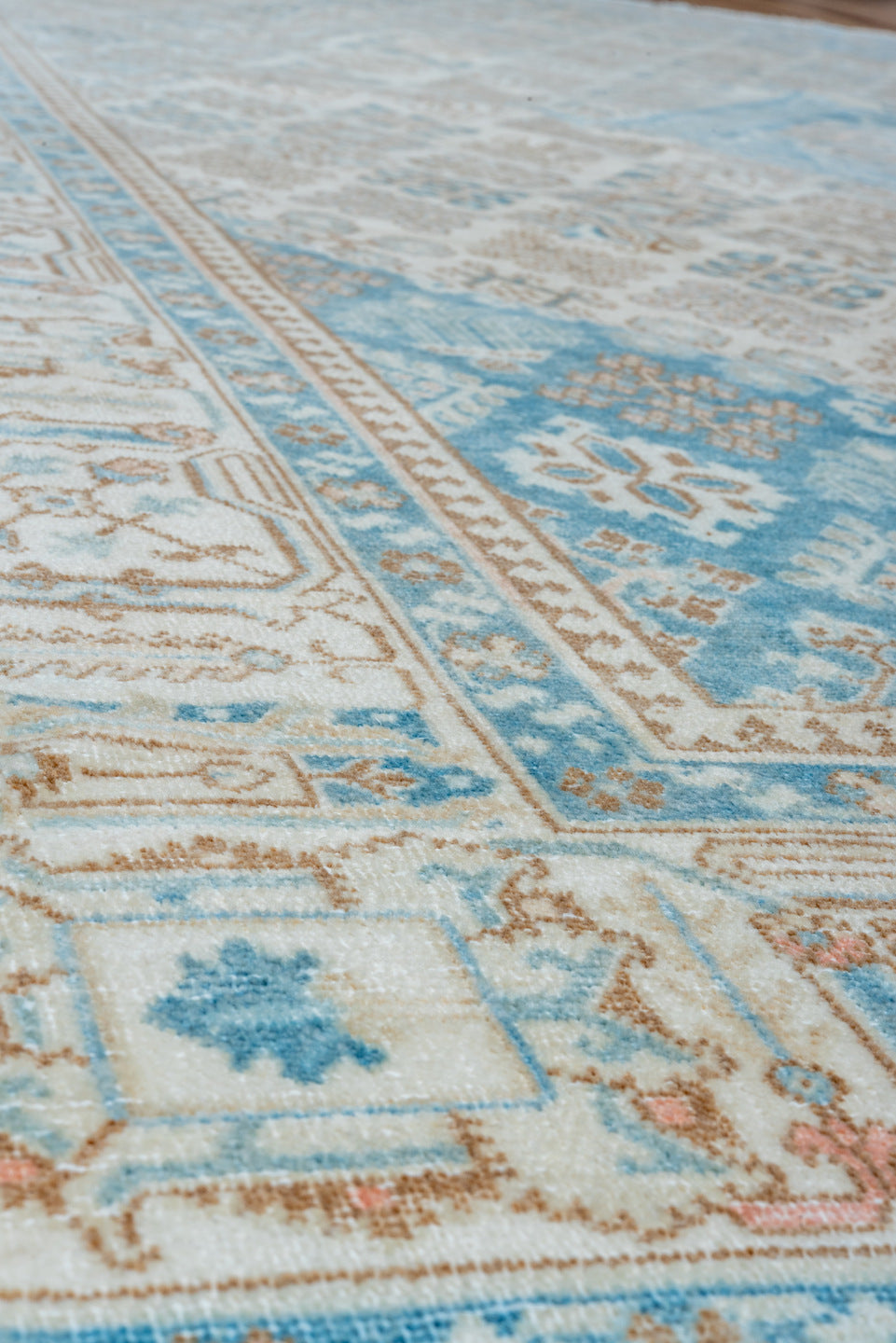 7' x 11' one-of-a-kind handmade vintage Joshegan large size rug. Color palette: ivory, sky blue, taupe, beige, camel