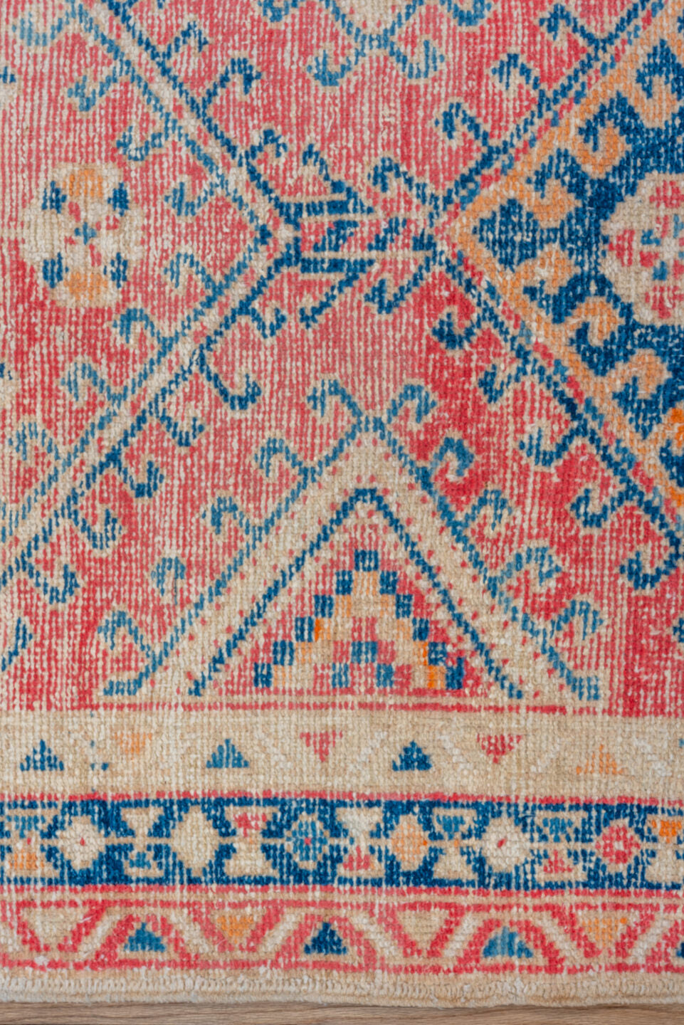 3' x 9' one-of-a-kind handmade vintage Heriz runner rug. Color palette: coral, ivory, navy, sky_blue, rose, saffron