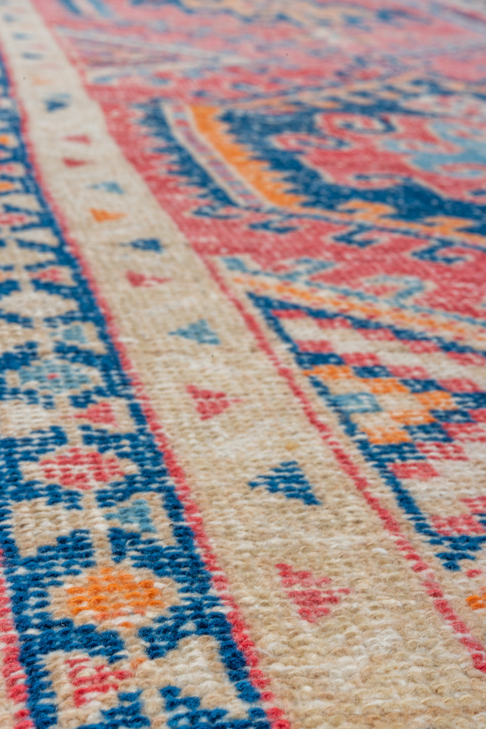 3' x 9' one-of-a-kind handmade vintage Heriz runner rug. Color palette: coral, ivory, navy, sky_blue, rose, saffron