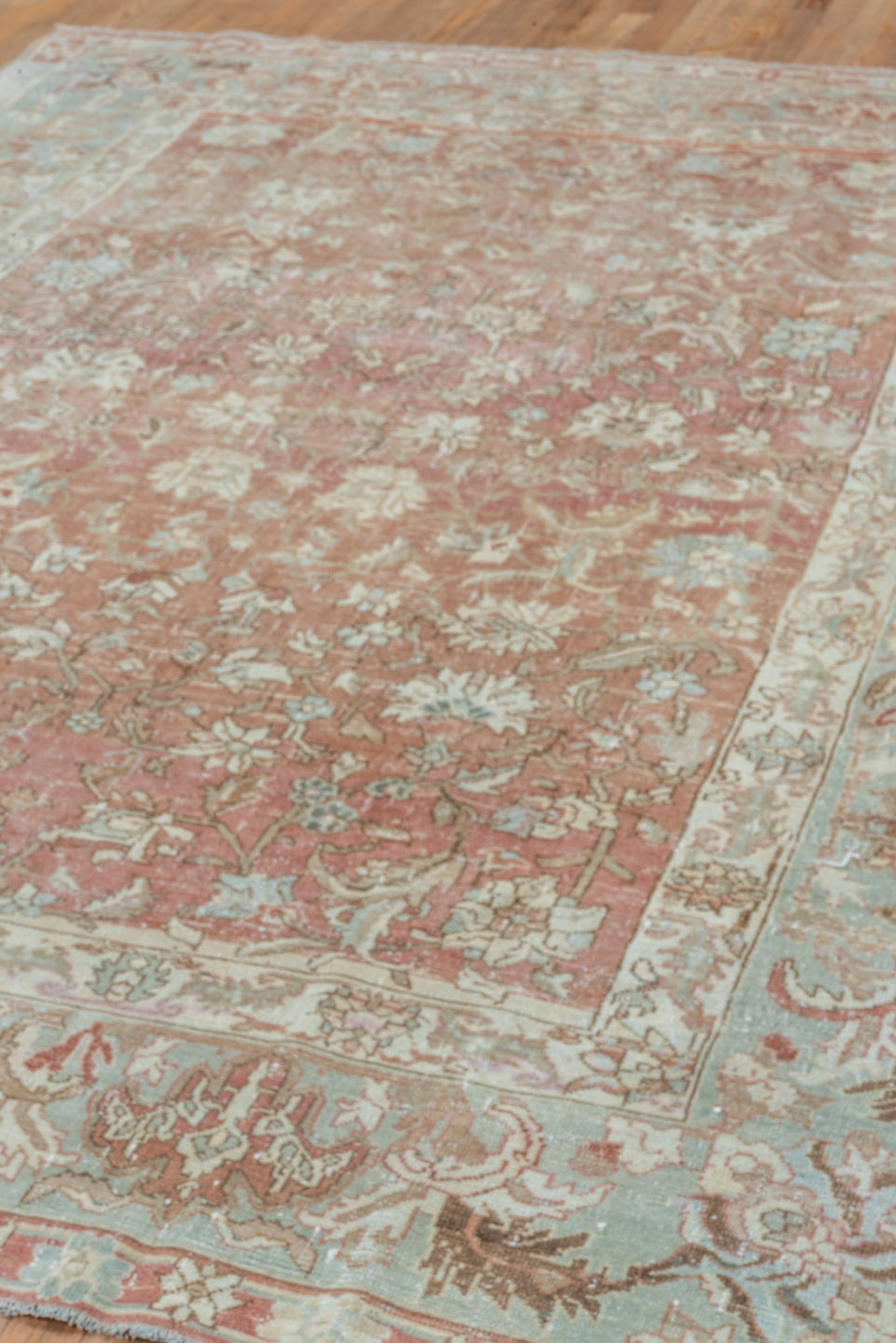 7' x 9' one-of-a-kind handmade vintage Malayer rug. Color palette: rose, pale blue, ivory, terra cotta, taupe, camel, brown