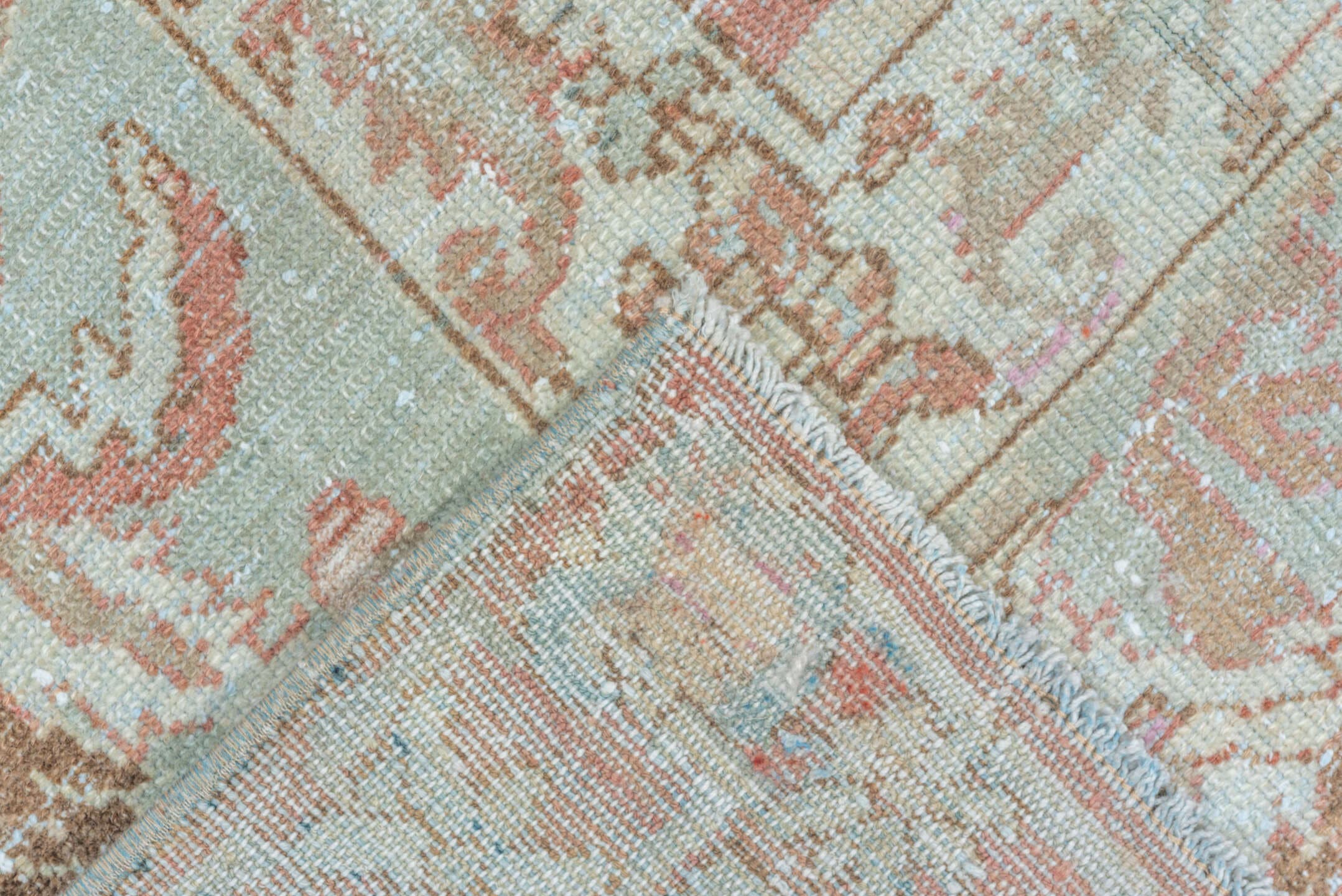 7' x 9' one-of-a-kind handmade vintage Malayer rug. Color palette: rose, pale blue, ivory, terra cotta, taupe, camel, brown