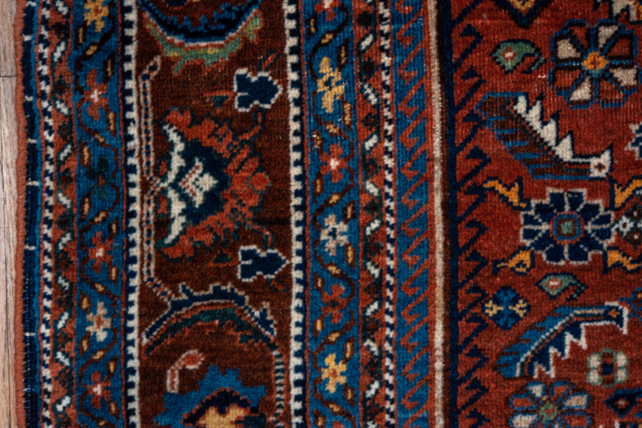 3' x 5' one-of-a-kind handmade vintage Shiraz small size rug. Color palette: rust, turquoise, navy, ivory, camel, brown