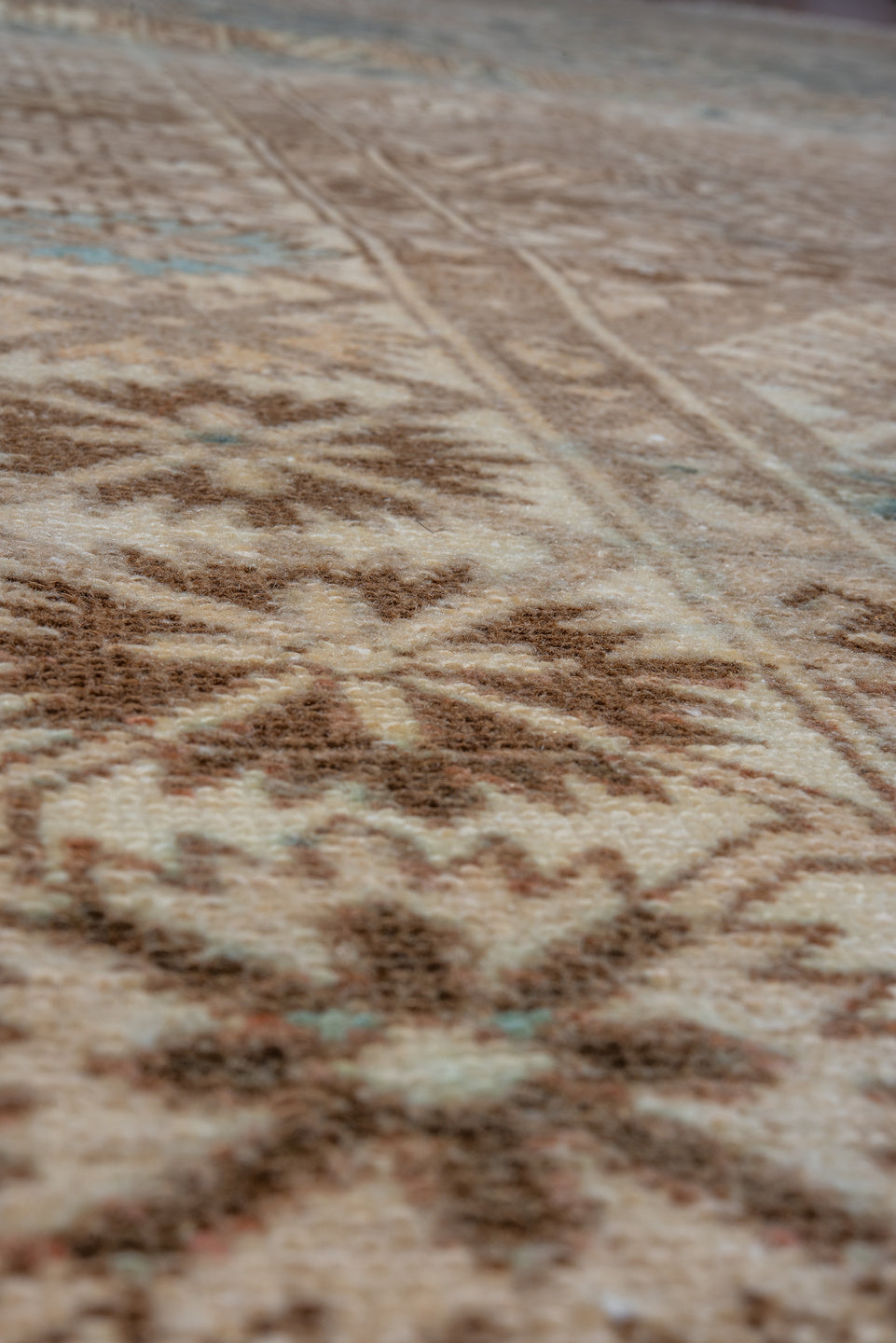 5' x 10' one-of-a-kind handmade vintage Baktiary medium size rug. Color palette: camel, ivory, taupe, brown, sky_blue, beige