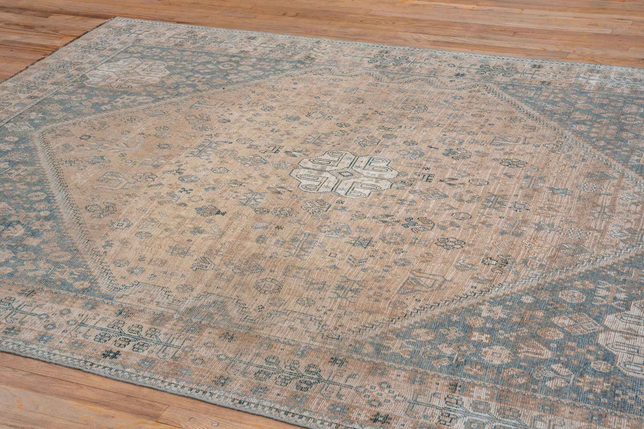 7' x 10' one-of-a-kind handmade vintage Shiraz large size rug. Color palette: ivory, sky blue, beige, taupe, camel, slate